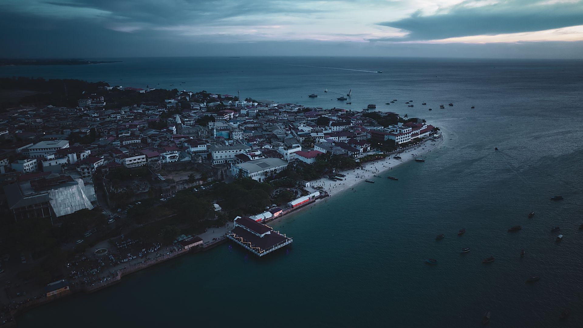 Cliffside bar overlooking the ocean at sunset, Zanzibar
